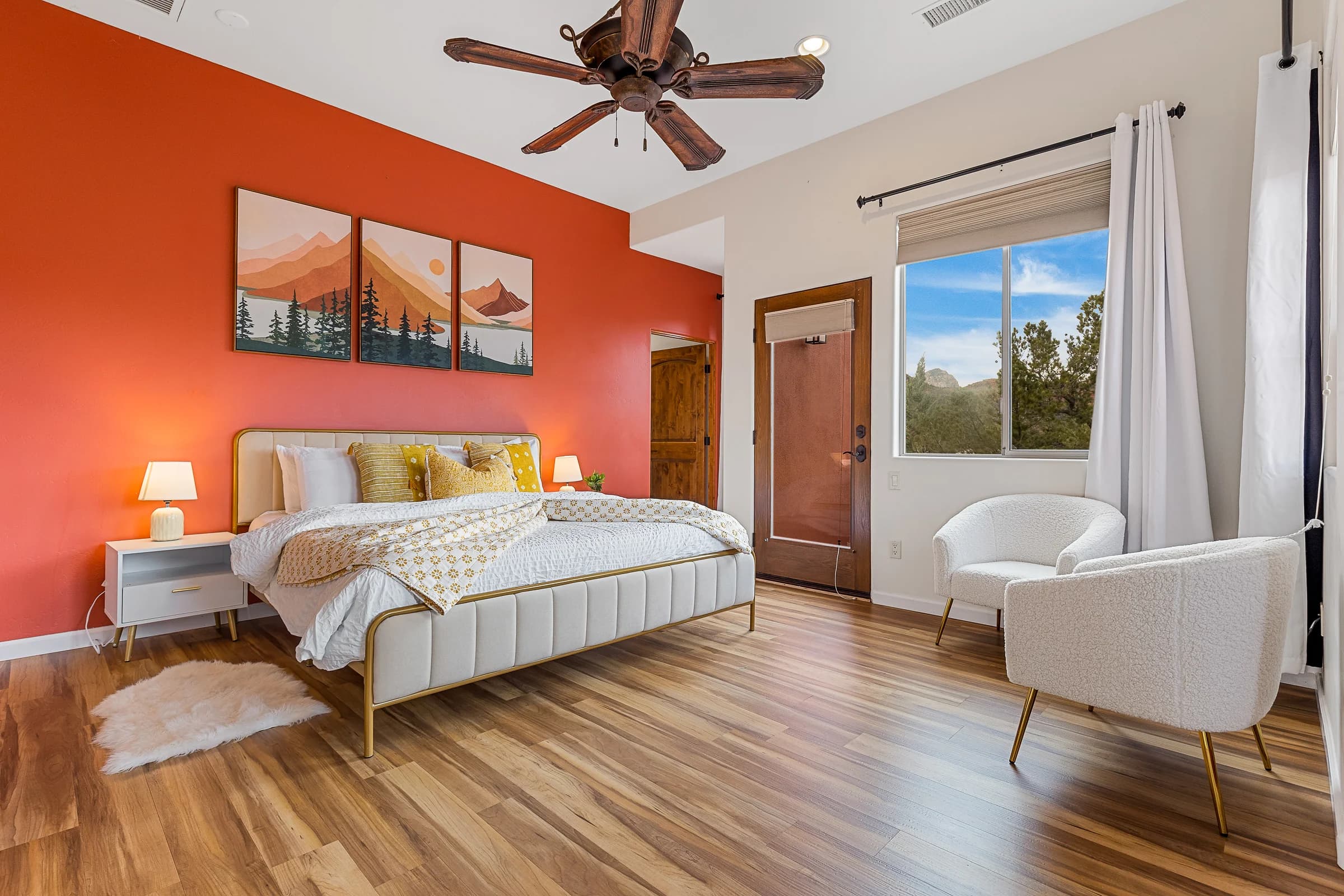 Master bedroom with king bed and red rock views
